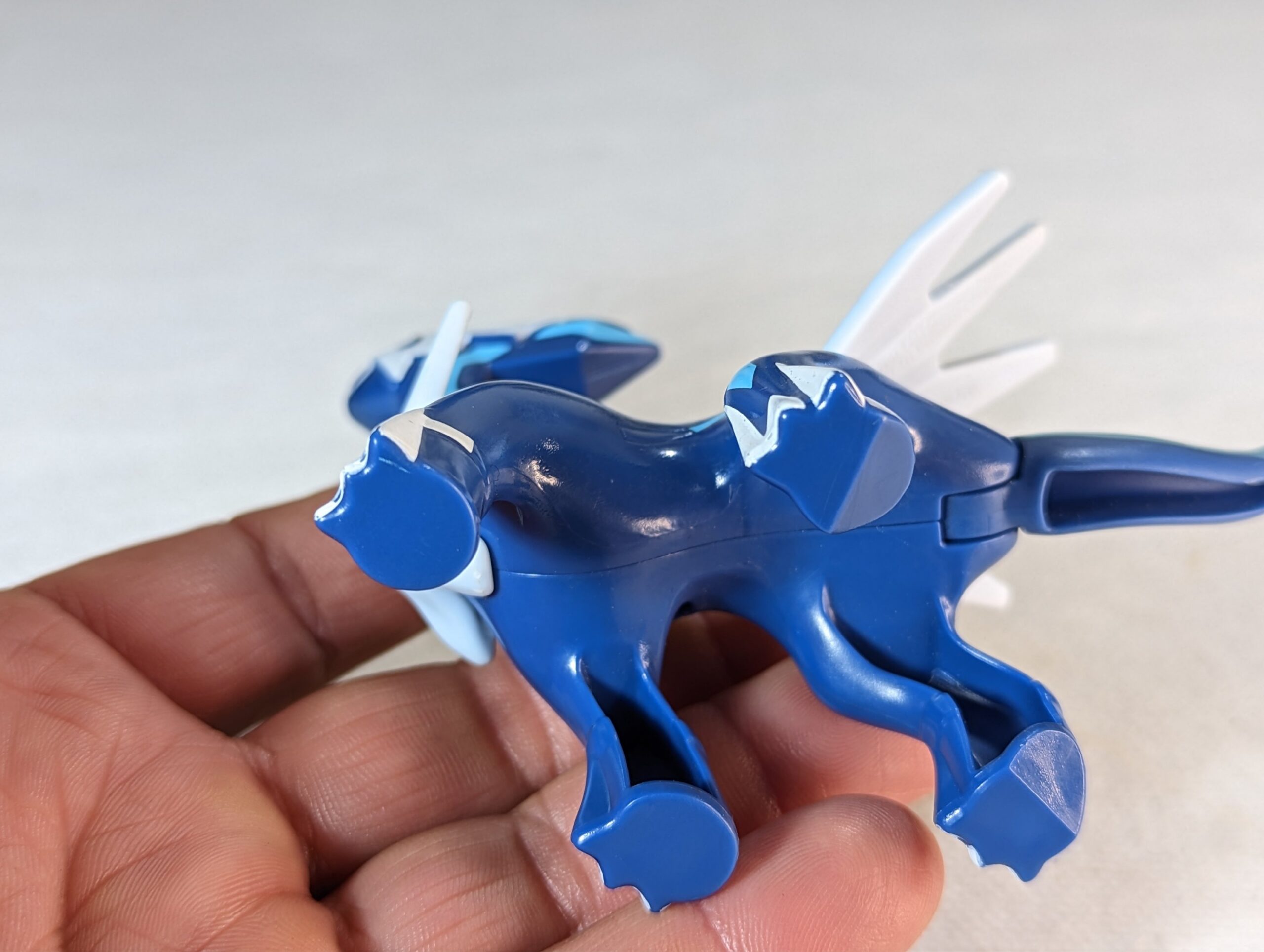 Foto de Modelo Plástico De Um Brinquedo De Pokemon Dialga Da Refeição Feliz  De Mcdonald S Em Um Fundo Azul e mais fotos de stock de Pokémon - iStock