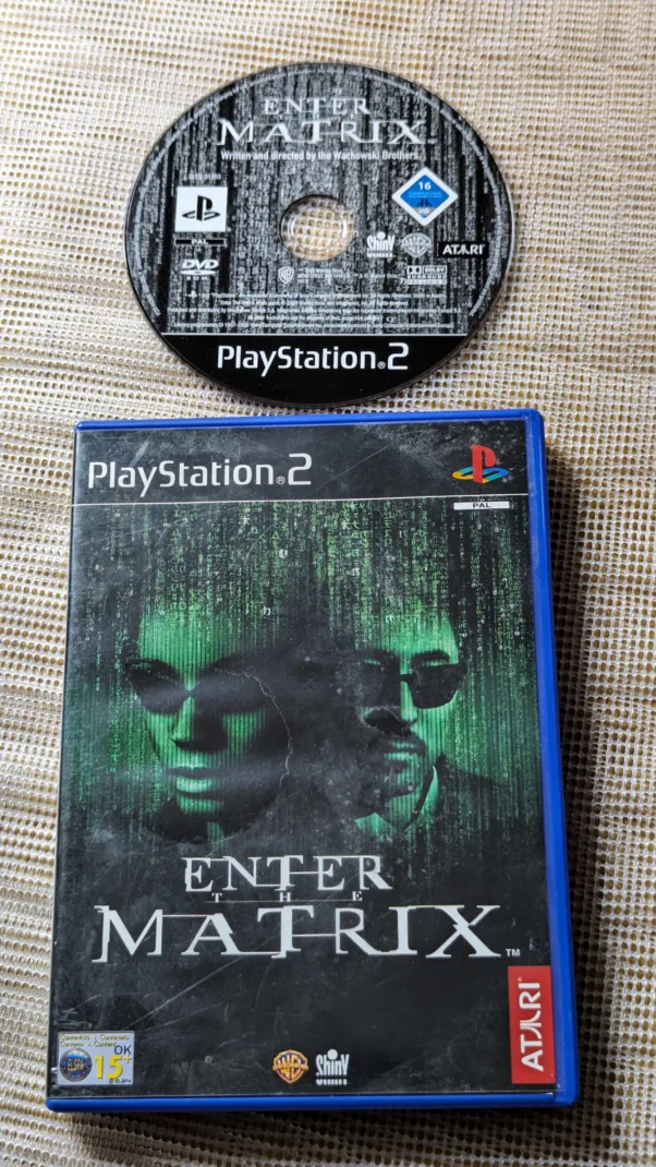 PS2 ORIGINAL MÍDIA FÍSICA E MANUAL (PAL) ENTER MATRIX (TEM IDIOMA EM ESPANHOL) – 190 gramas – USADO (UK) PREÇO DO FRETE NA DESCRIÇÃO